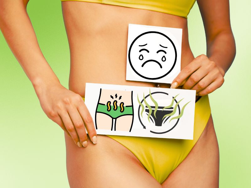 devojka drži dva papirića u ruci simulirajući na neprijatan miris u intimnoj regiji